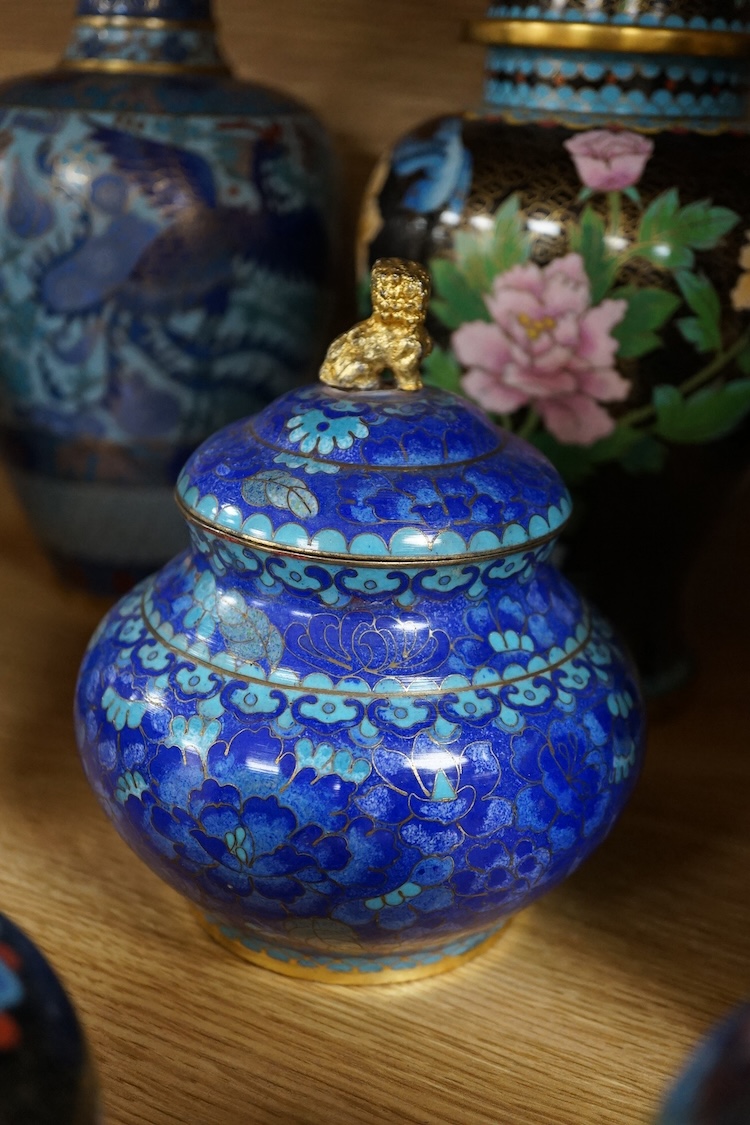 Thirteen various sized Chinese cloisonné enamel jars with covers and similar vases, tallest vase 31cm high.